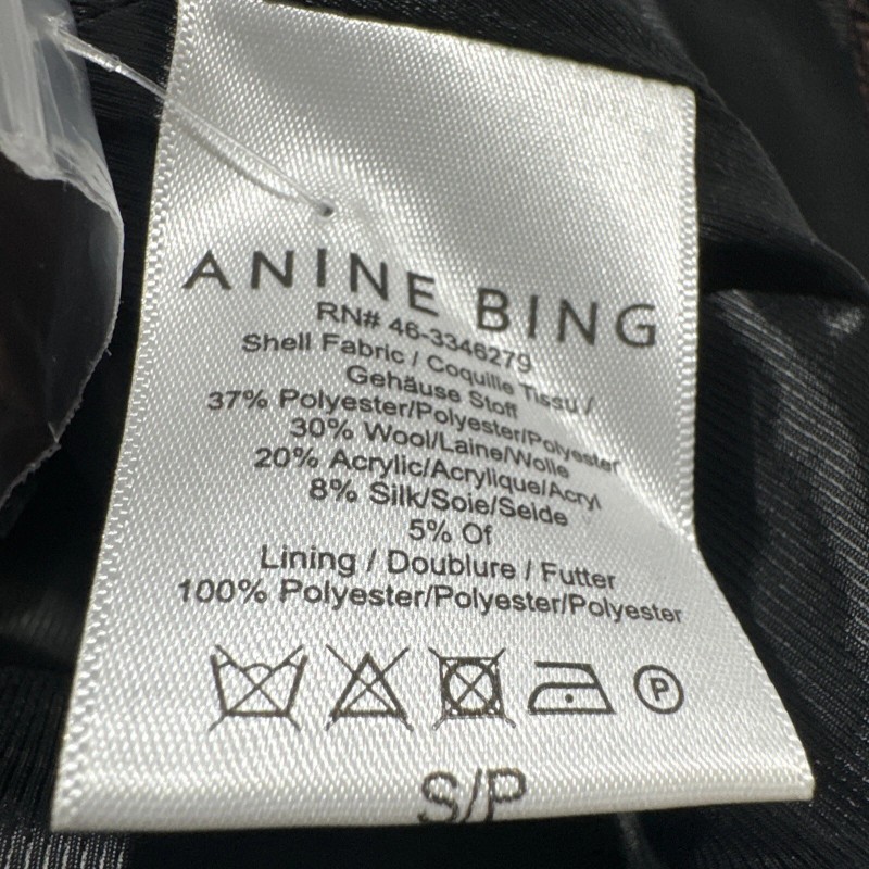 Anine Bing features double breasted closure with a cropped, boxy