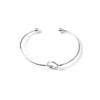 YIQPKUM Stainless Steel Tie The Love Knot Open Cuff Bangle