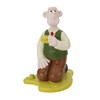 Wallace and Gromit Garden Statue. Wallace Eats Cheese