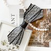 Burnaby monotone diamond pattern hair ribbon pin / 버나비 모노톤