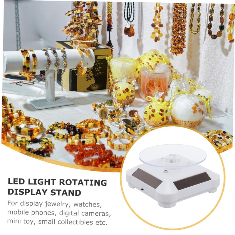 FOMIYES 360° Rotating Solar Watch Stand Jewelry Display Led Lighting