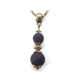 Women's necklace with black lava stone beads and Tibetan beads in antique bronze