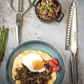 Global 8 inch Hollow Ground Chef's Knife - Lightweight Japanese Stainless Steel, Razor-Sharp Edge, Made in Japan, G-77