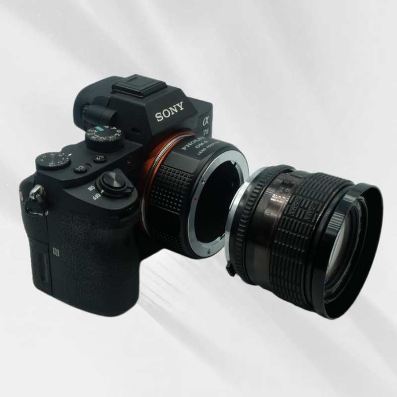 PHOLSY Enfoque Manual Adaptador de Objetivo Compatible con Objetivos Olympus