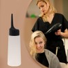 Botella de tinte para el cabello vacía con punta inclinada