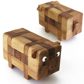 PIG PUZZLE The Break of the Pig's Head. Puzzle made of solid wood with difficulty level 2/6. French brand Le Délirant® CE standard. Disassemble the 13 pieces of the piggy from 8 years old.