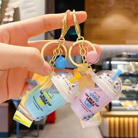 HSYHERE Men Women Creative Cute Lovely Simulation Fortune Cat Good Luck Lucky Kitty Milk Tea Cup Keychain Keyrings, Moving Sand Car Key Chain Key Ring Bag Pendant Key Holder Strap Bell -Green