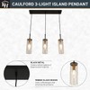 Kenroy Home Caulford Collection Ribbed Glass 3-Light Black Metal Island