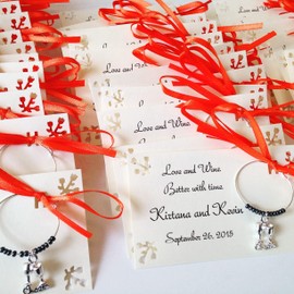 1 to 150 wine and vineyard themed wine charms for bridal shower favors rehearsal dinner favors and wedding favors for guests. 1 charm set. Fully customized.