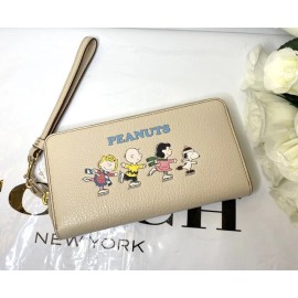 Coach NWT Coach CF219  Peanuts Long Zip Around Wallet Snoopy & Friends Motif