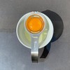 Separador de yema de huevo en acero inoxidable con mango