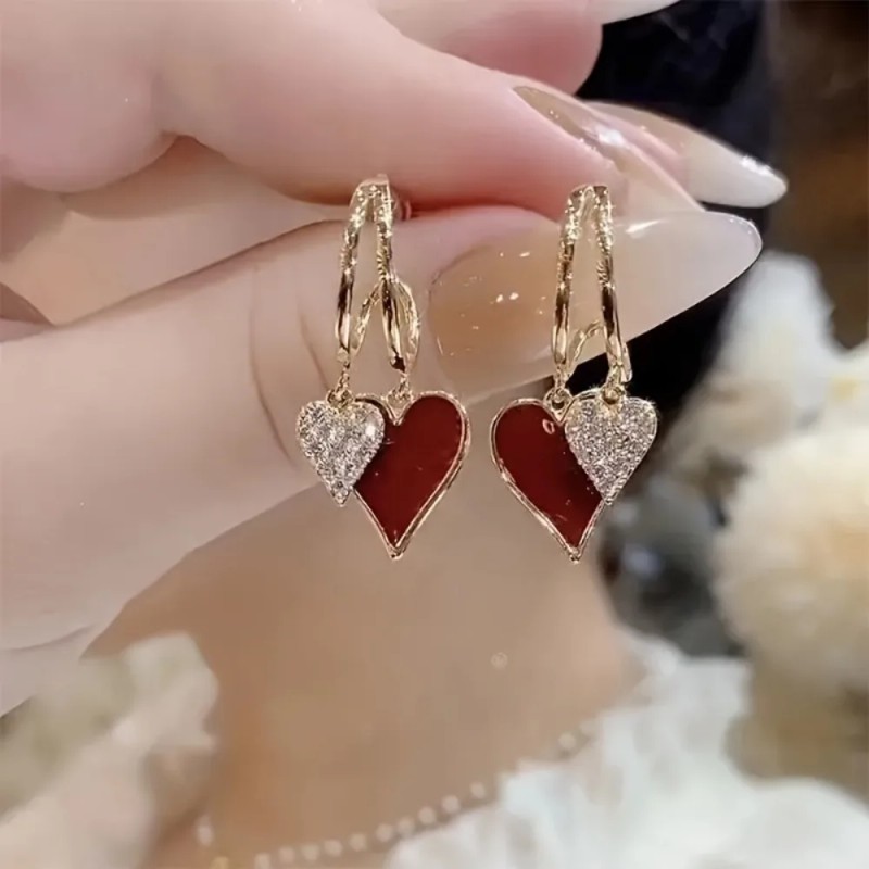 Distinctive Heart-Shaped Dangling Earrings with a Glossy End, Elegantly Easy