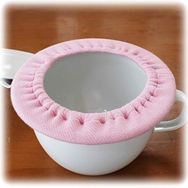 This is an enamel potty cover [100% organic cotton] quinari