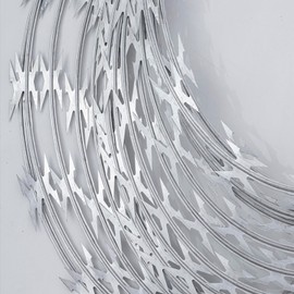 LMYYGOO 345 FT Razor Wire, Concertina Wires, 7 Rolls,Silver, with a Warning Sign