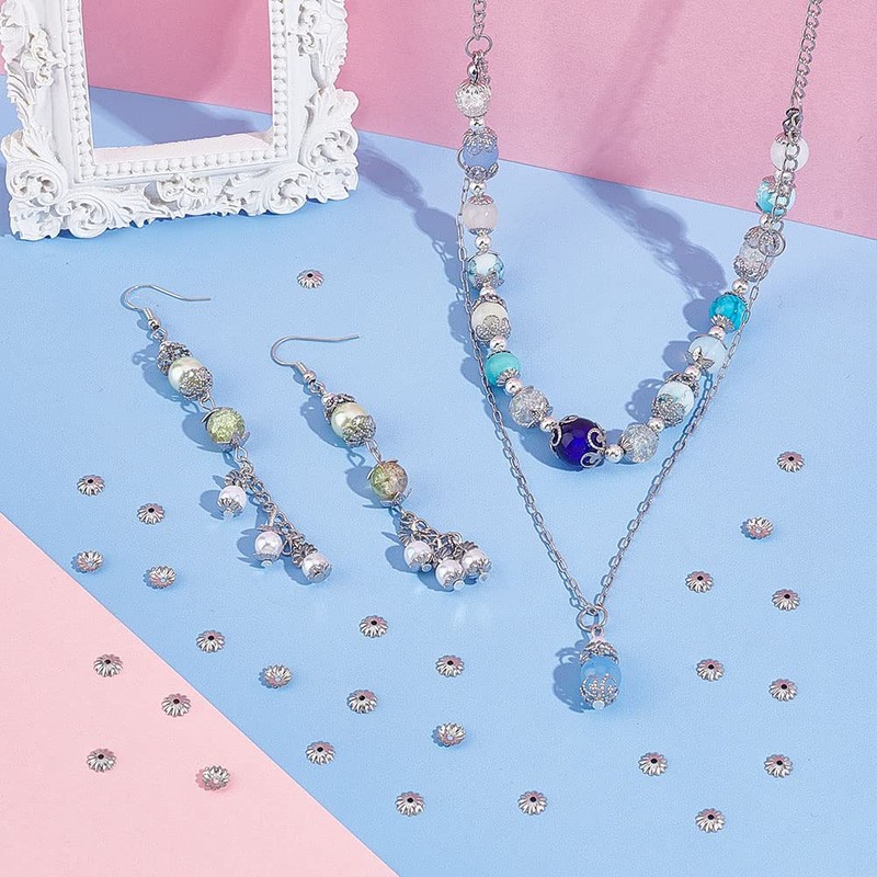 UNICRAFTALE 300個 長さ5.5mm 304ステンレススチール マルチペタルビーズキャップ 中空フラワーコーン メタル フィリグリー ビーズキャップ スペーサー