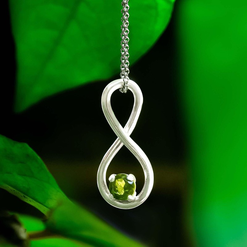 Starborn Faceted Moldavite Infinity Pendant in fine Sterling Silver