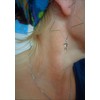 Delicate star hoop earrings made of stainless steel. Star-shaped large