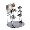 Steelman24 I Nuts and bolts sculpture Female Teacher With A