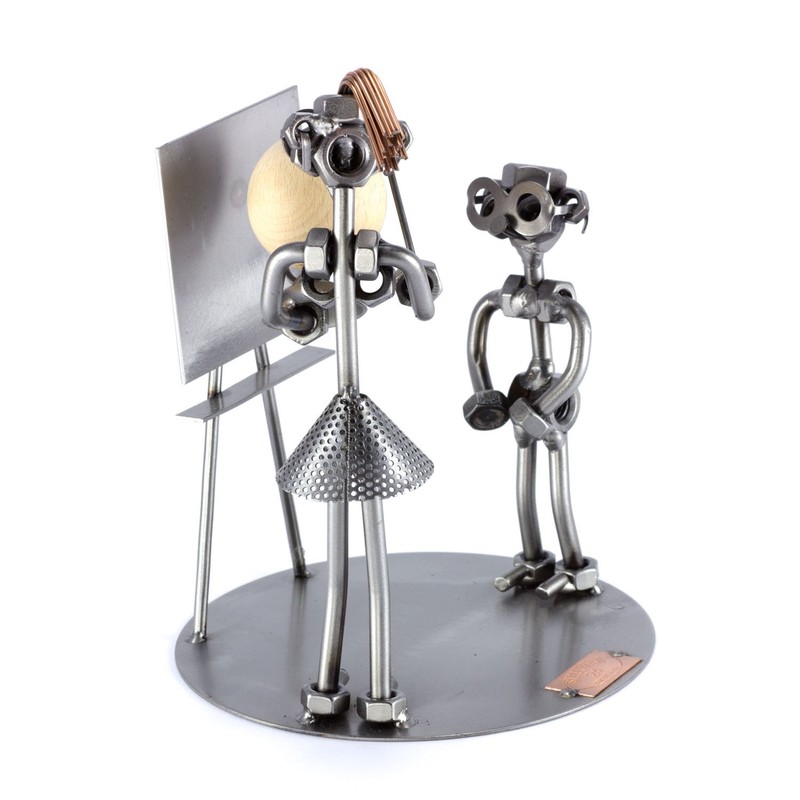 Steelman24 I Nuts and bolts sculpture Female Teacher With A