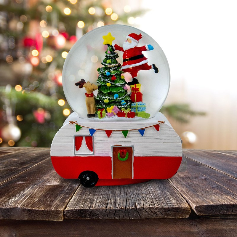 Santa Decorating Tree Snow Globe on Camper by The San