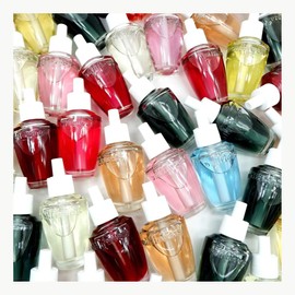 Bath & Body 4-Pack Wallflowers Refills (Assorted Fragrance Mystery Scents) Flat Bottoms, without tags or packaging