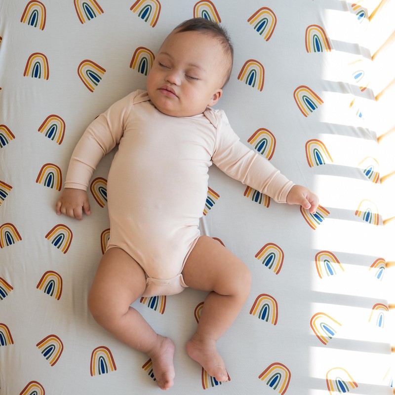 Crib Sheet in Rust Rainbow on Oat