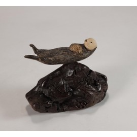 Sea Otter Mother and Pup Sculpture byJohn Perry 5in Long on Polished burlwood Base. Signed.
