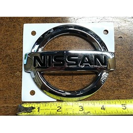 NEW OEM NISSAN XTERRA 2002-2004 REAR HATCH EMBLEM - NISSAN LOGO /. BADGE