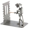 Steelman24 I Nuts and bolts sculpture Fireman House Call I