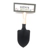 "Welcome to Ken's garden" hanging shovel sign