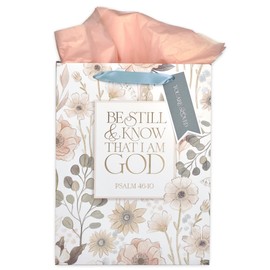 Christian Art Gifts Large Portrait Inspirational Scripture Gift Bag, Tag & Wrapping Tissue Paper Set for Women: Be Still Bible Verse Psalm, White Multicolor Floral & Gold Design, Satin Ribbon Handles