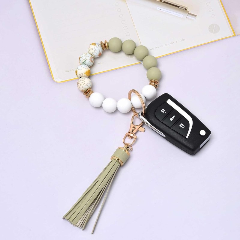 Pulsera de silicona con abalorio, llavero para mujer, con borla