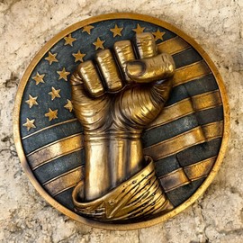 Patriotic Fist Wall Décor – 6” Diameter 3D Artwork with American Flag Design, Rustic Bronze Finish, Freedom, Strength, Stars and Stripes Sculpture for Home or Office - Defiant USA Hanging Art Plaque – United States of America Décor