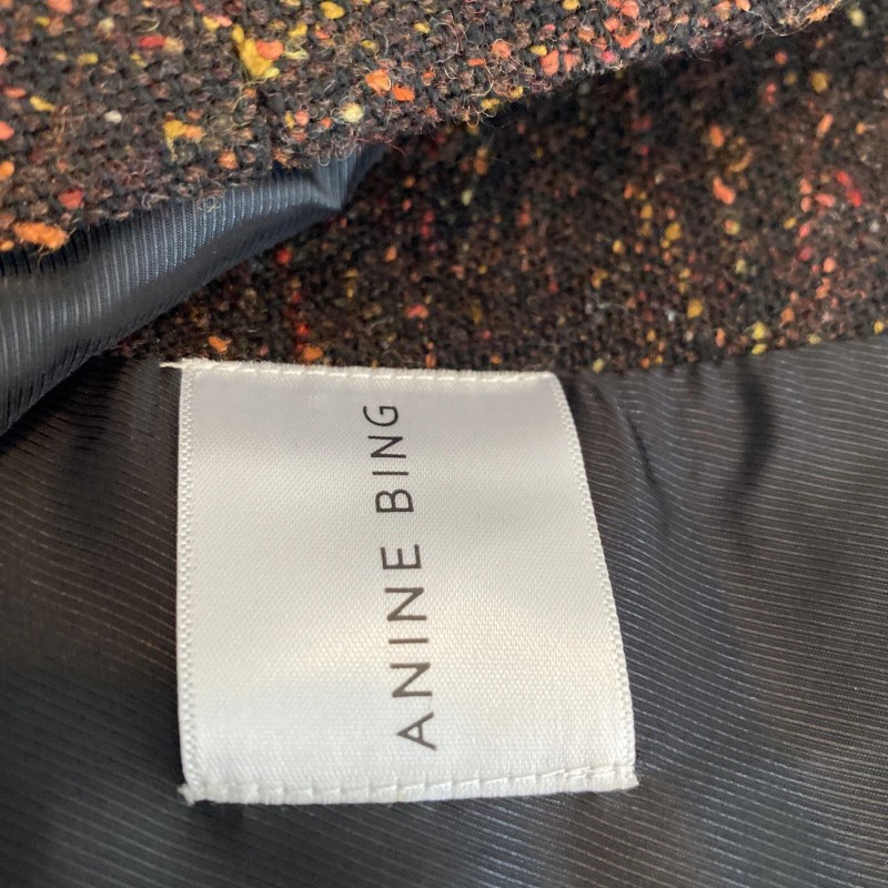 Anine Bing features double breasted closure with a cropped, boxy
