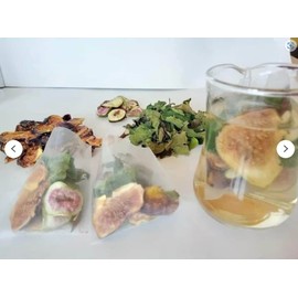 12 Organic 5 gram Fig Tea Bags with dried leaves and sliced fruit in a Resealable Bag