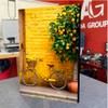 CUADRO DECORATIVO PAISAJE PARED BICICLETA AMARILLA (40X27CM)