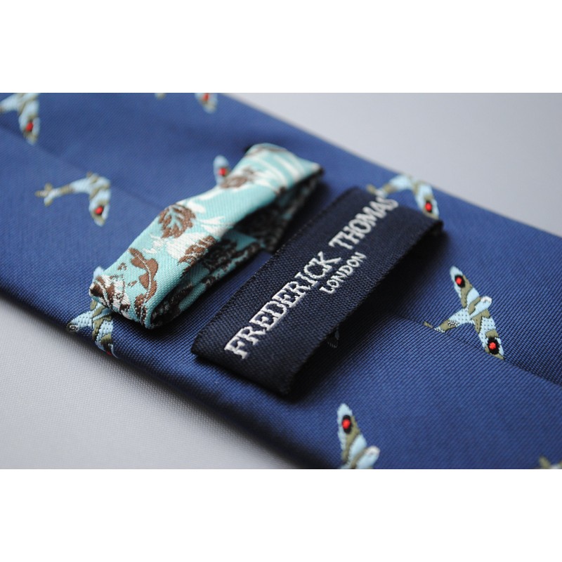 Frederick Thomas navy tie with spitfire plane pattern and signature