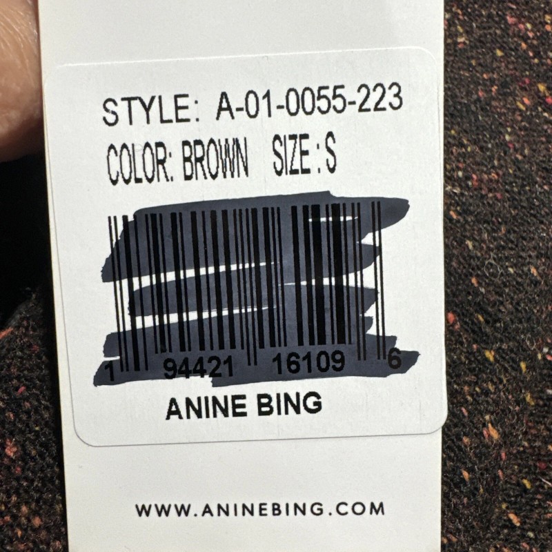 Anine Bing features double breasted closure with a cropped, boxy