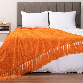 Pavilia Orange Knit Woven Blanket with Tassel, Decorative Textured Blanket for Living Room, Twin Size 60x80