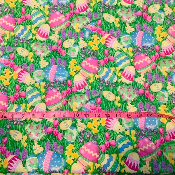 Fabric Traditions Brightly colored Easter eggs and Flowers All Over