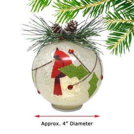 Cardinal Christmas Ornament - Lighted Ball Xmas Decoration - Snow & Holly Accents with Greenery & Pinecones - 4" Diameter
