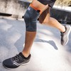 Verstärkte Kniebandage von Thuasne Sport - Grau/Orange - Größe L