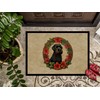 Caroline's Treasures DAC2322MAT Black Russian Terrier Christmas Flowers Doormat Front