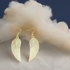 Angel Wings Earrings in a Gold Shade