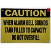 CAUTION WHEN ALARM BELL SOUNDS TANK FILLED TO CAPACITY DO