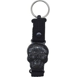 Llavero metálico con la figura de una calavera alusiva al folclore mexicano grabada con adornos de varios diseños
