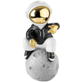 BRUBAKER Decorative Astronaut Sitting on the Moon in Cool Pose - 24 cm Spaceman Space Figure with Chrome-plated Helmet and Black Hoodie - Hand-Painted Statue - Gold, Black and White