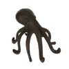 Soporte de teléfono celular de hierro fundido con pulpo