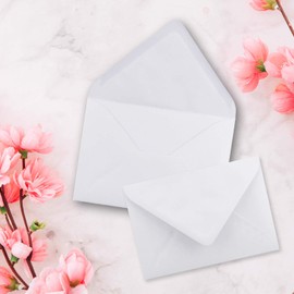 C7 envelopes, pointed flap, wet glue.