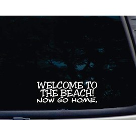 Welcome to The Beach! Now go Home - 7 1/2" x 2 5/8" Funny die Cut Vinyl Decal/Bumper Sticker for Windows, Cars, JDM, Trucks, Bumpers, Tool Boxes, Boats, laptops - virtually Any Hard, Smooth Surface